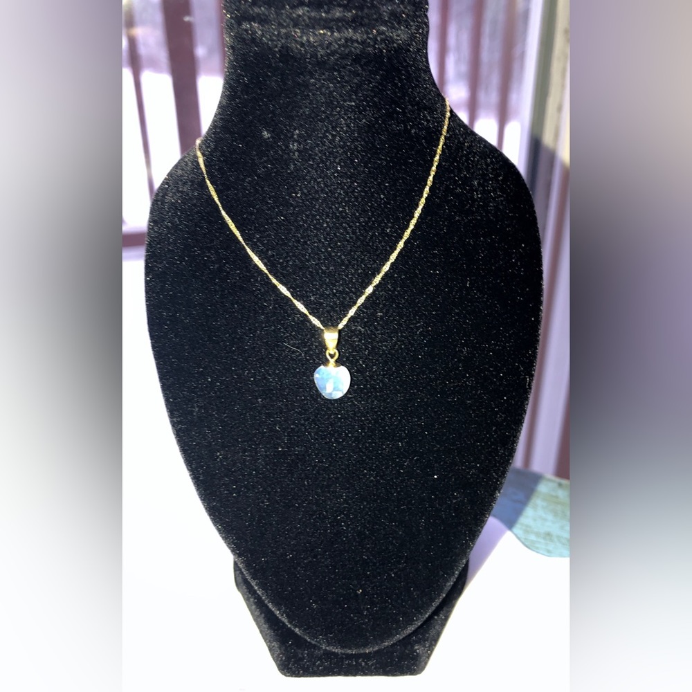 Faceted heart shaped Opal pendant
